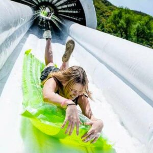 inflatable water slide woman on green float
